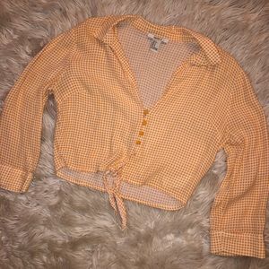 Yellow cropped shirt